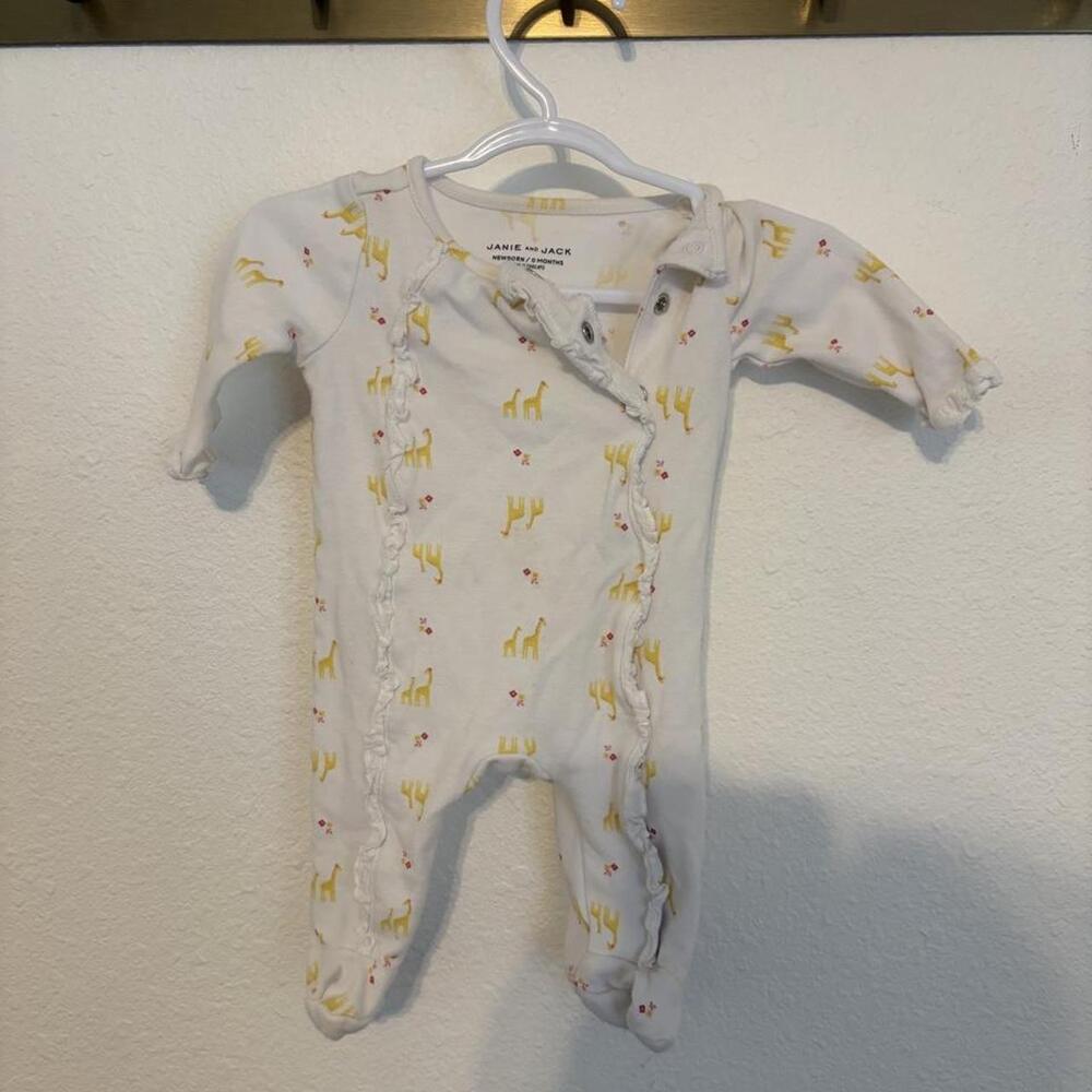 Janie and Jack newborn white baby romper with yellow giraffe print